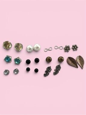11 Sets of Earrings. Sold As Group. Excellent Condition!